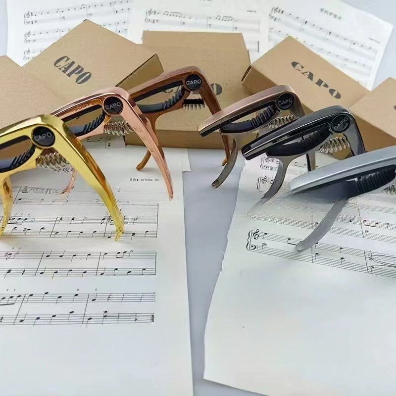 Musical Instrument Ending In A - Alat Musik Gitar Capo Logam Gitar