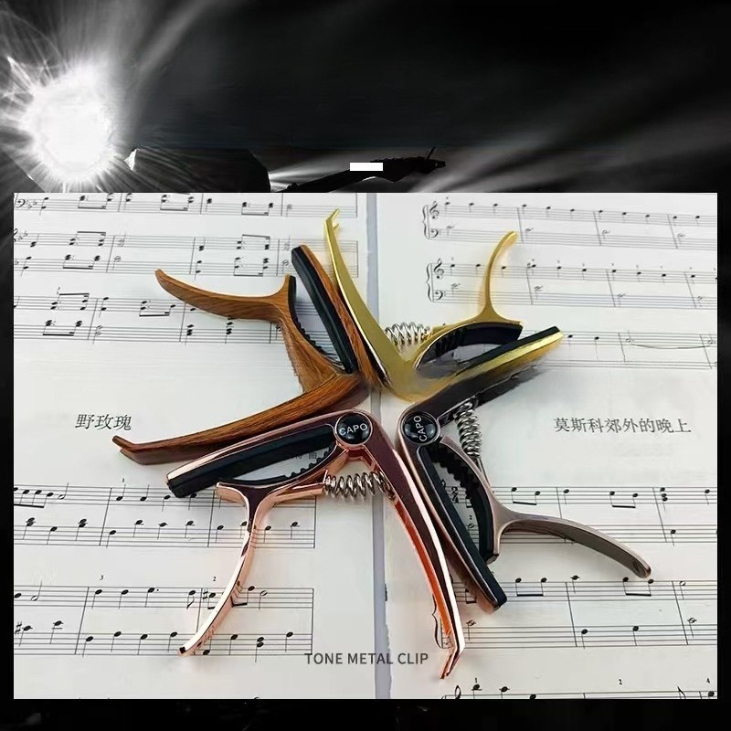 Alat Musik Gitar Capo Logam Gi - Musical Instrument Ending In A ulasan dan harga