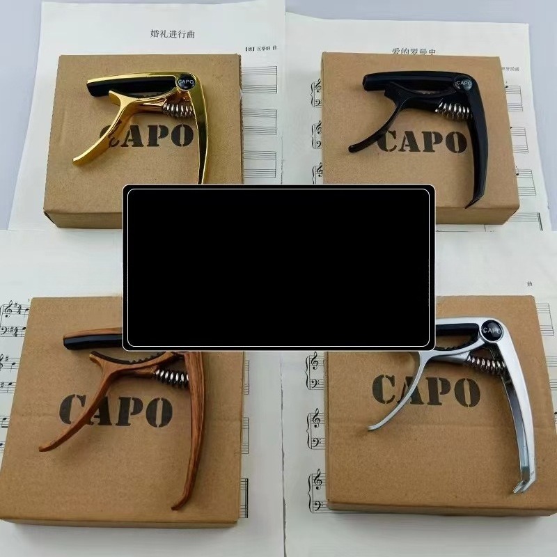 Alat Musik Gitar Capo Logam Gi - Musical Instrument Ending In A ulasan dan harga